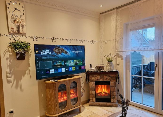 „Gemütlichkeit am Kaminfeuer“